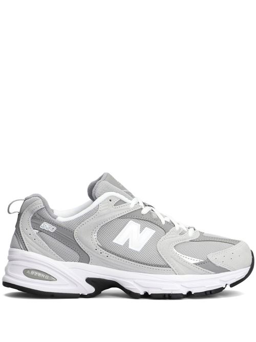 Sneaker grigia di NEW BALANCE caratterizzata da logo laterale a contrasto bianco, suola segmentata e lacci. NEW BALANCE | MR530CKRAINCLOUD